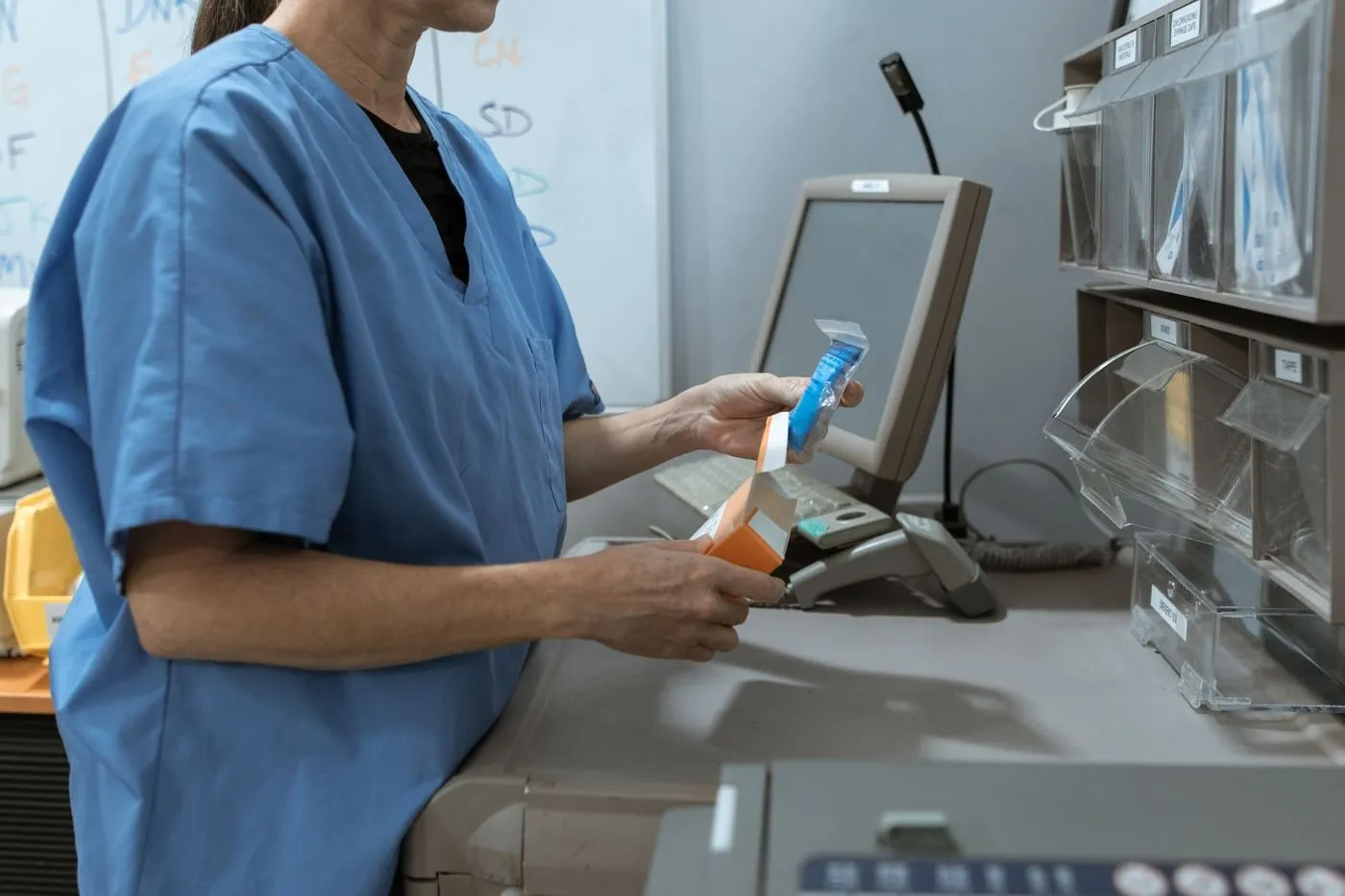 Pharmacist handling medicines