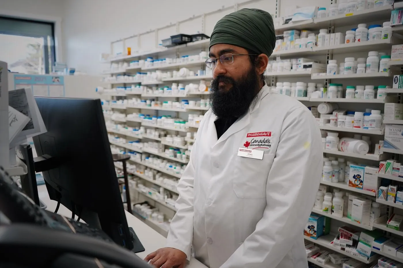 Pharmacist at a pharmacy counter